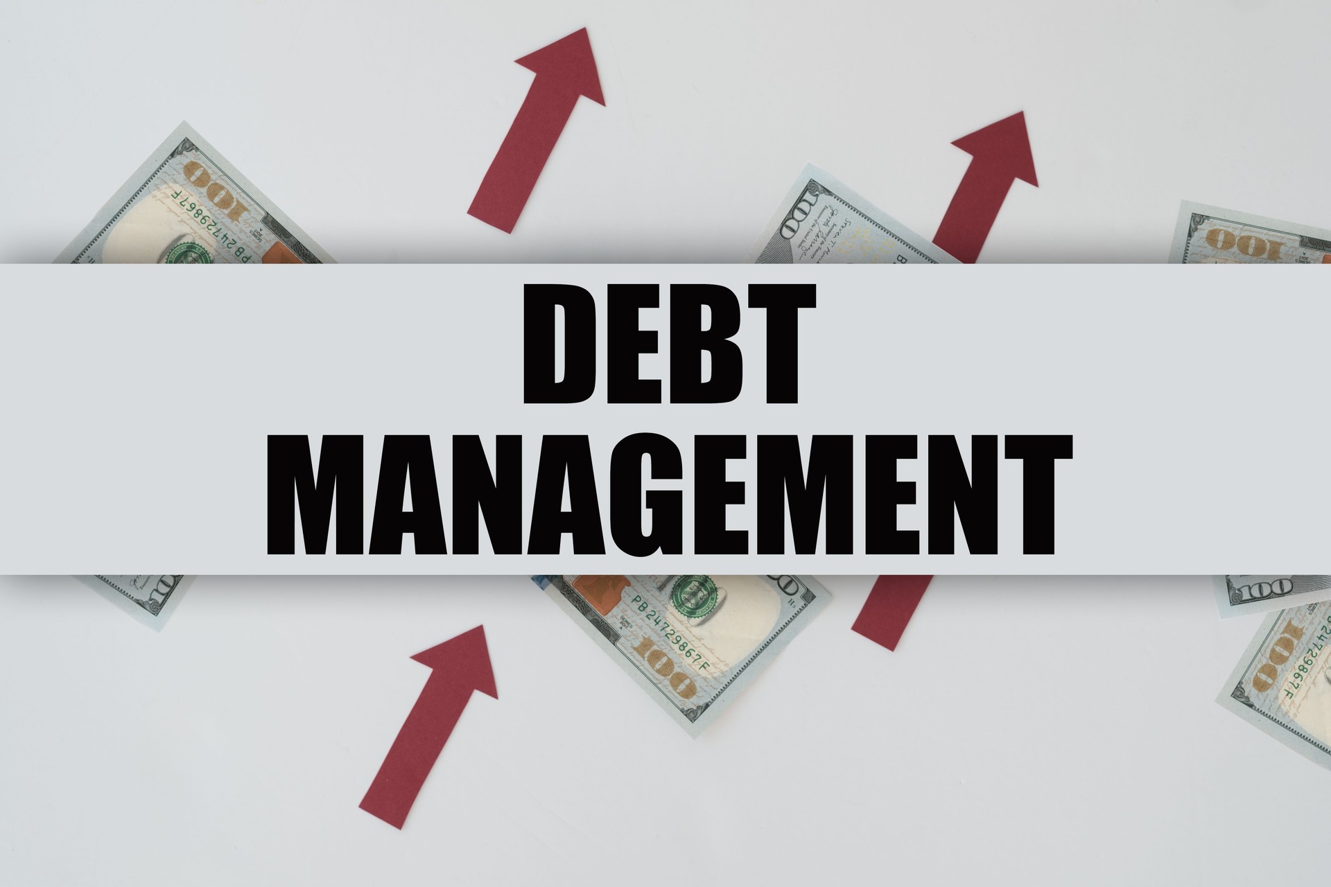 notepad with calculations and inscription debt management